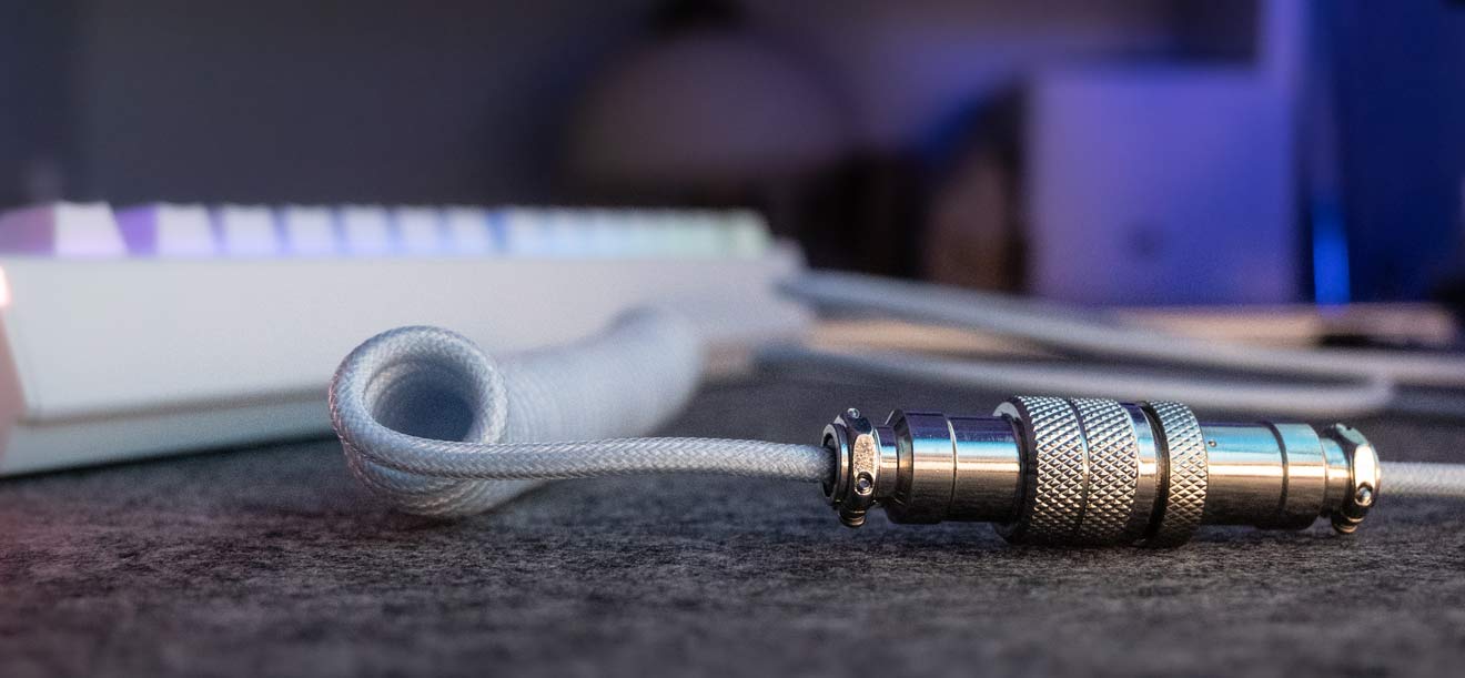 Spiral Cable on a desk nclose to mechanical keyboard